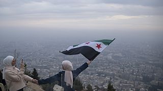 Mujeres sirias en la cima del monte Qasioun