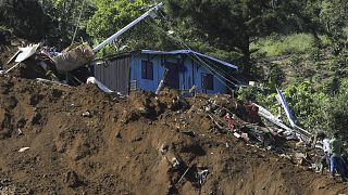 A destroyed home after a deadly landslide was triggered by heavy rain in Bello, Antioquia state, Colombia on Wednesday 25 June.